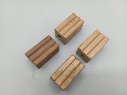 Wooden pedal blocks from the late 19th and early 20th centuries.